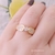 Anel Zircônia Central e Mini Zircônias Cravejadas Banhado a Ouro 18k - comprar online