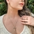 Colar Crucifixo Cravejado de Zircônias Banhado a Ouro 18k - comprar online