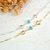 Pulseira Dois Corações e Zircônia Azul Banhada a Ouro 18k e Prata