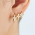 Brinco de Argolinha Crucifixo Cravejado de Mini Zircônias Banhado a Ouro 18k - comprar online