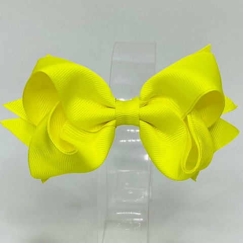 Laço no bico de pato boutique invertido amarelo