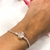 Pulseira de berloques 2,4mm símbolo O coroa cravejado prata 925 - comprar online