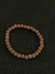 Pulseira bola sintética (menor)