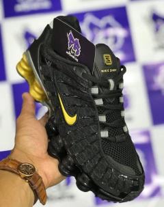 nike shox tl 12 molas preto/dourado