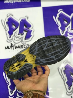 mizuno wave pro 7 cinza e dourado na internet