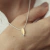 Colar Ella oval mini com ouro e diamante