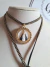 Colar Courinho Nossa Senhora Aparecida Circular- Preto com dourado na internet