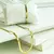 Kit colar e pulseira fita dourado em aço inoxidável