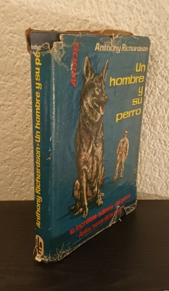 Un hombre y su perro (usado, cover con detalles, hoja con dedicatoria arrancada) - Anthony Richardson