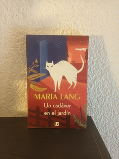 Un cadavér en el jardin (usado, firma del anterior dueño) - Maria Lang