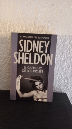 El capricho de los dioses (2011) (usado, detalle en contratapa) - Sidney Sheldon