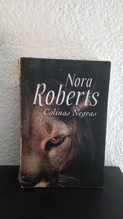 Colinas Negras (usado, detalle en tapa y canto, interior en muy buen estado.) - Nora Roberts