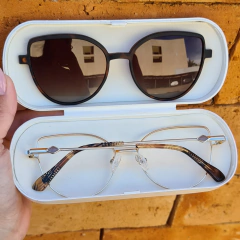 C0264 - OCULOS CLIP-ON MANU DOURADO COM ANIMAL PRINT - comprar online