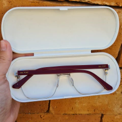 XC807 - ARMAÇÃO CONVENCIONAL MADALENA DOURADO COM BORDÔ na internet