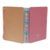 Planner Diskô Poá Rosa Médio aberto, com capas em tons de rosa e amarelo na parte de trás, mostrando as argolas coloridas no centro.