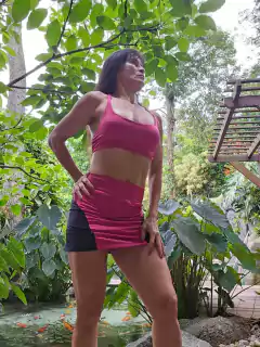 Image of CONJUNTO VÁRIAS CORES SHOR-SAIA COM BOLSO FAKE DE RENDA E TOP COM "X" NAS COSTAS E ARGOLA
