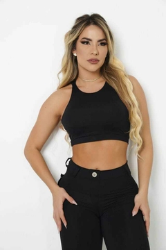 CALÇA PASSANTE COM BOTÃO E BOLSO FRUFRU PRETA en internet