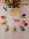 Pingente pompom saúde para necessaire, bolsinhas