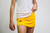 POLLERA SHORT VENECIA NIÑA - OCRE en internet