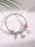 Pulseira com berloque banhada a prata