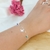 Pulseira de Borboletas com Pingente de Pedra Azul e Verde Banhada a Prata