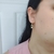 Brinco de Filhos com 2 Meninos com Zircônias Banhados a Ouro 18k na internet