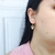 Brinco de Filhos com 2 Meninas com Zircônias Banhados a Ouro 18k na internet