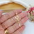 PULSEIRA DE CORAÇÕES TRABALHADOS COM DETALHES DE ZIRCÔNIAS BANHADA A OURO 18K - comprar online