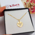 COLAR COM MEDALHA DE ANJO VAZADO BANHADA A OURO 18K - comprar online