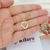 COLAR COM MEDALHA DE ANJO VAZADO BANHADA A OURO 18K