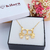 COLAR DE FILHOS COM CASAL E ANJO COM ZIRCÔNIAS BANHADO A OURO 18K