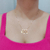 COLAR DE FILHOS COM CASAL E ANJO COM ZIRCÔNIAS BANHADO A OURO 18K - comprar online
