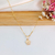 COLAR COM PINGENTE DE PATINHA COM ZIRCÔNIAS BANHADO A OURO 18K na internet