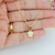 COLAR COM PINGENTE DE PATINHA COM ZIRCÔNIAS BANHADO A OURO 18K