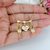 COLAR DE FILHOS 2 MENINAS E CORAÇÃO COM OS NOMES GRAVADOS BANHADOS A OURO 18K