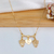 COLAR DE FILHOS 2 MENINAS E CORAÇÃO COM OS NOMES GRAVADOS BANHADOS A OURO 18K na internet