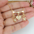 COLAR DE FILHOS 2 MENINOS E CORAÇÃO COM OS NOMES GRAVADOS BANHADOS A OURO 18K