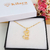 COLAR COM PINGENTE DE CACHORRINHO COM ZIRCÔNIAS BANHADO A OURO 18K - comprar online