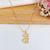 COLAR COM PINGENTE DE CACHORRINHO COM ZIRCÔNIAS BANHADO A OURO 18K na internet