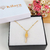 COLAR COM PINGENTE DE ESCOVA CABELEIREIRA BANHADO A OURO 18K - comprar online
