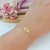 PULSEIRA DE FOLHA VAZADA BANHADA A OURO 18K