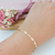 PULSEIRA TRABALHADA CRUZ VAZADA BANHADA A OURO 18K