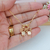 COLAR DE FILHOS 2 MENINAS COM ZIRCÔNIAS BANHADAS A OURO 18K