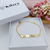 PULSEIRA INFANTIL DE CHAPINHA COM NOSSA SENHORA APARECIDA E NOME GRAVADO BANHADA A OURO 18K