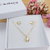 CONJUNTO DE COLAR E BRINCOS DE CORAÇÃO CRAVEJADOS DE ZIRCÔNIAS BANHADOS A OURO 18K