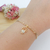 PULSEIRA DE FILHOS 1 MENINA COM ZIRCÔNIAS BANHADAS A OURO 18K