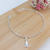 PULSEIRA DE NOSSA SENHORA APARECIDA COM ZIRCÔNIAS AZUIS BANHADA A PRATA - comprar online