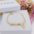 PULSEIRA INFANTIL DE CHAPINHA PERSONALIZADA COM ZIRCÔNIAS E PINGENTE DE MENINA BANHADA A OURO 18K