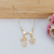 COLAR DE FILHOS 1 MENINO E 1 PATINHA COM ZIRCÔNIAS BANHADOS A OURO 18K - comprar online