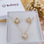 CONJUNTO DE COLAR E BRINCOS TREVO COM ZIRCÔNIAS BRANCAS BANHADO A OURO 18K - comprar online